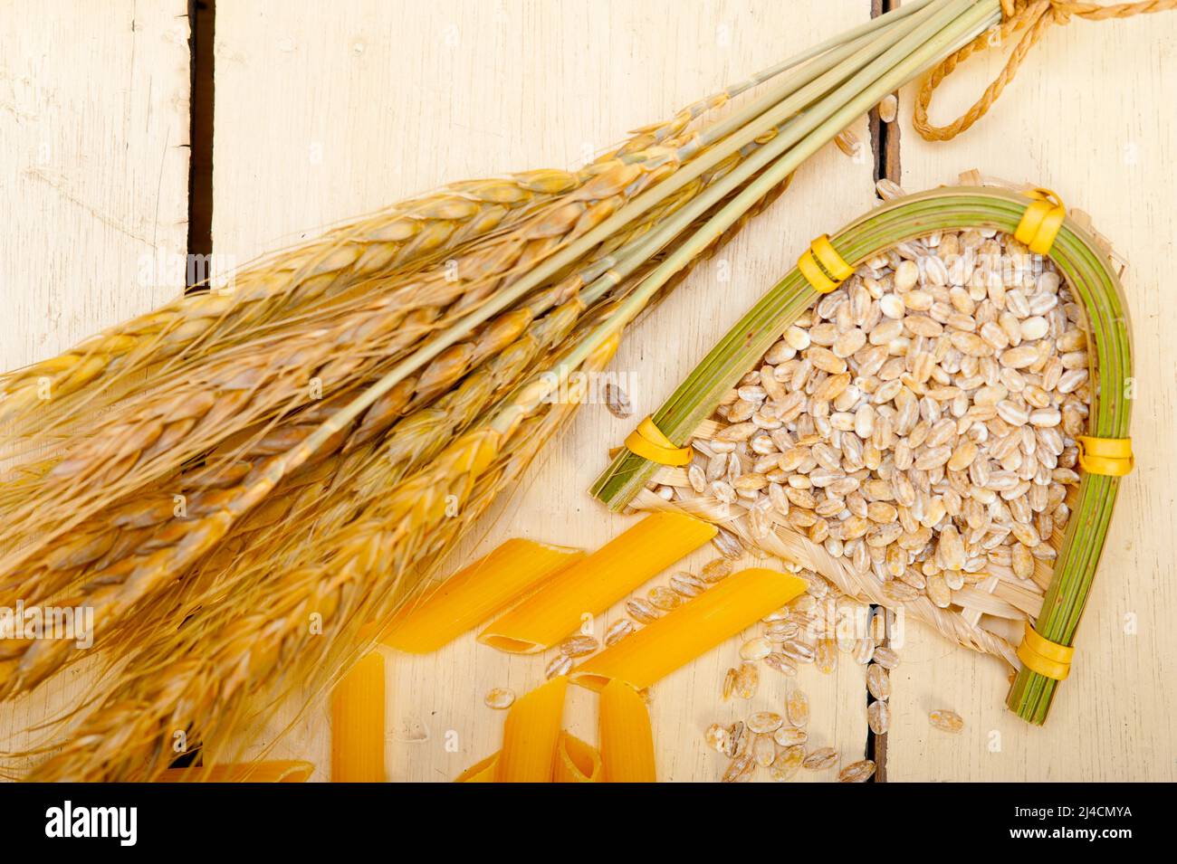 Short Italian pasta penne with durum wheat grains Stock Photo