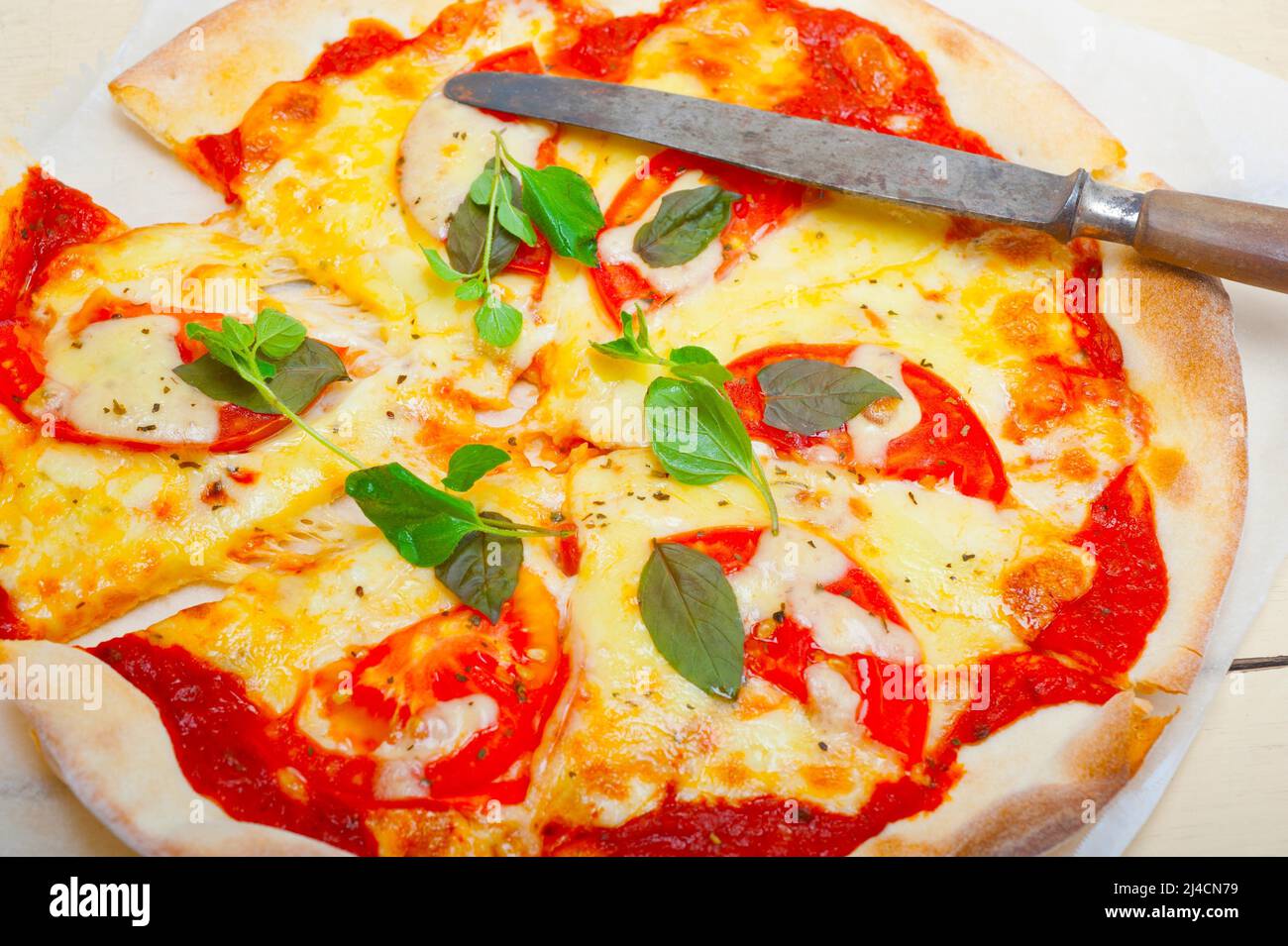 Italian traditional pizza Margherita tomato mozzarella and basil Stock