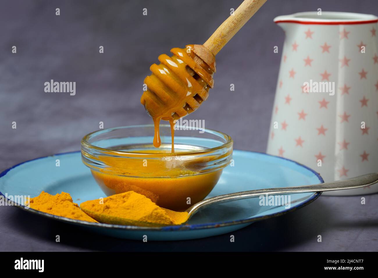 Bee honey with turmeric and turmeric powder, ingredient for Golden Milk