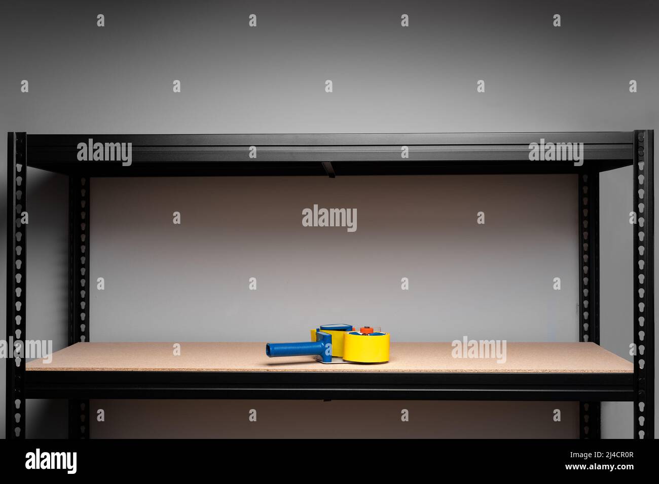 Scotch tape on the shelf of metal rack Stock Photo Alamy