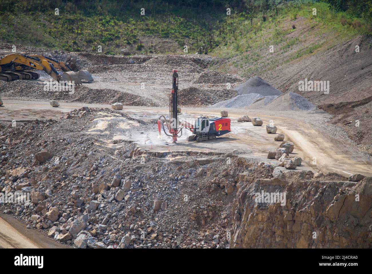 Drilling for blasting in limestone mining, Wuelfrath, North Rhine