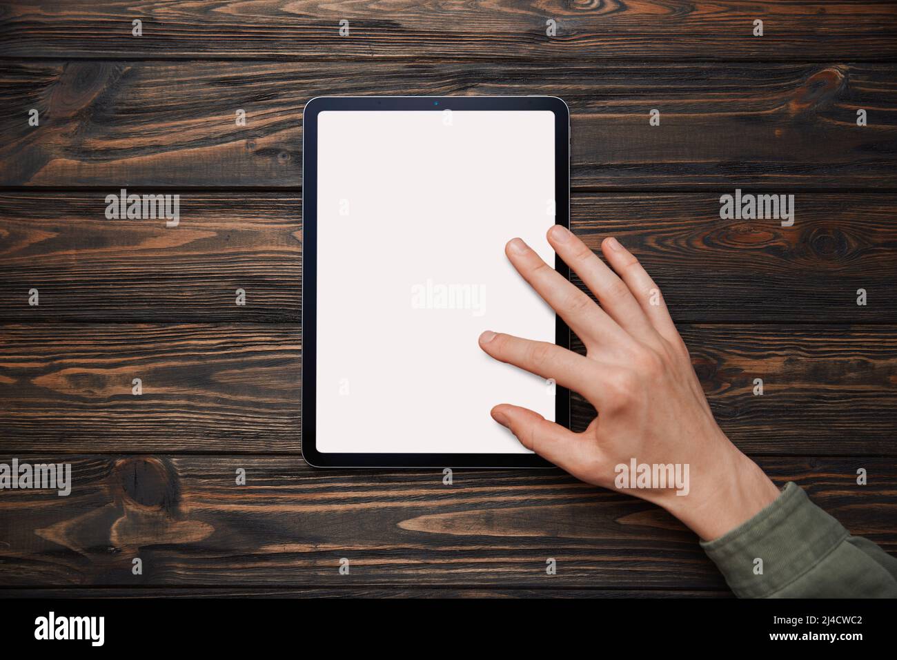 young man using a Tablet pc . close-up. Stock Photo