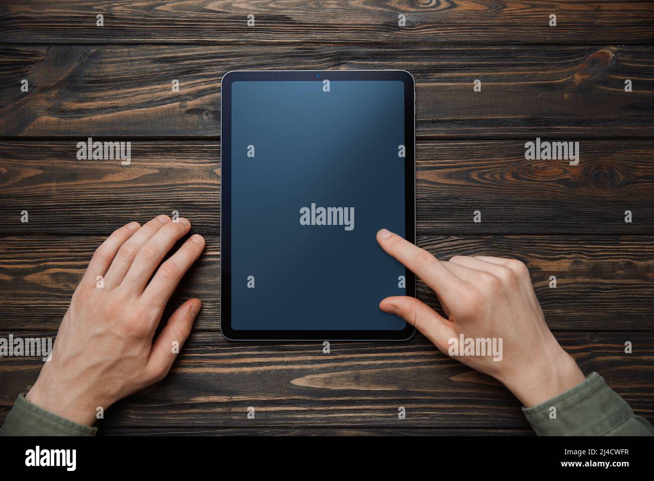 Photo Using Tablet Person using digital tablet, close up hi-res stock photography and ...