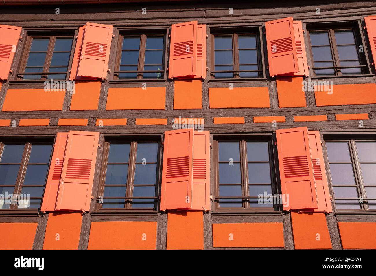Close-up of a timbered house and french windows in the old town of Strasbourg, La Petite France district, Strasbourg, Unesco World Heritage Site, Bas- Stock Photo