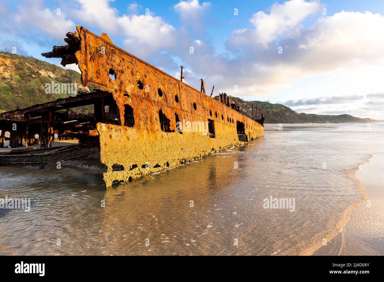 Starboard side of Maheno shipwreck, early morning on Seventy Five Mile Beach, Fraser Island, Queensland, Australia Stock Photo
