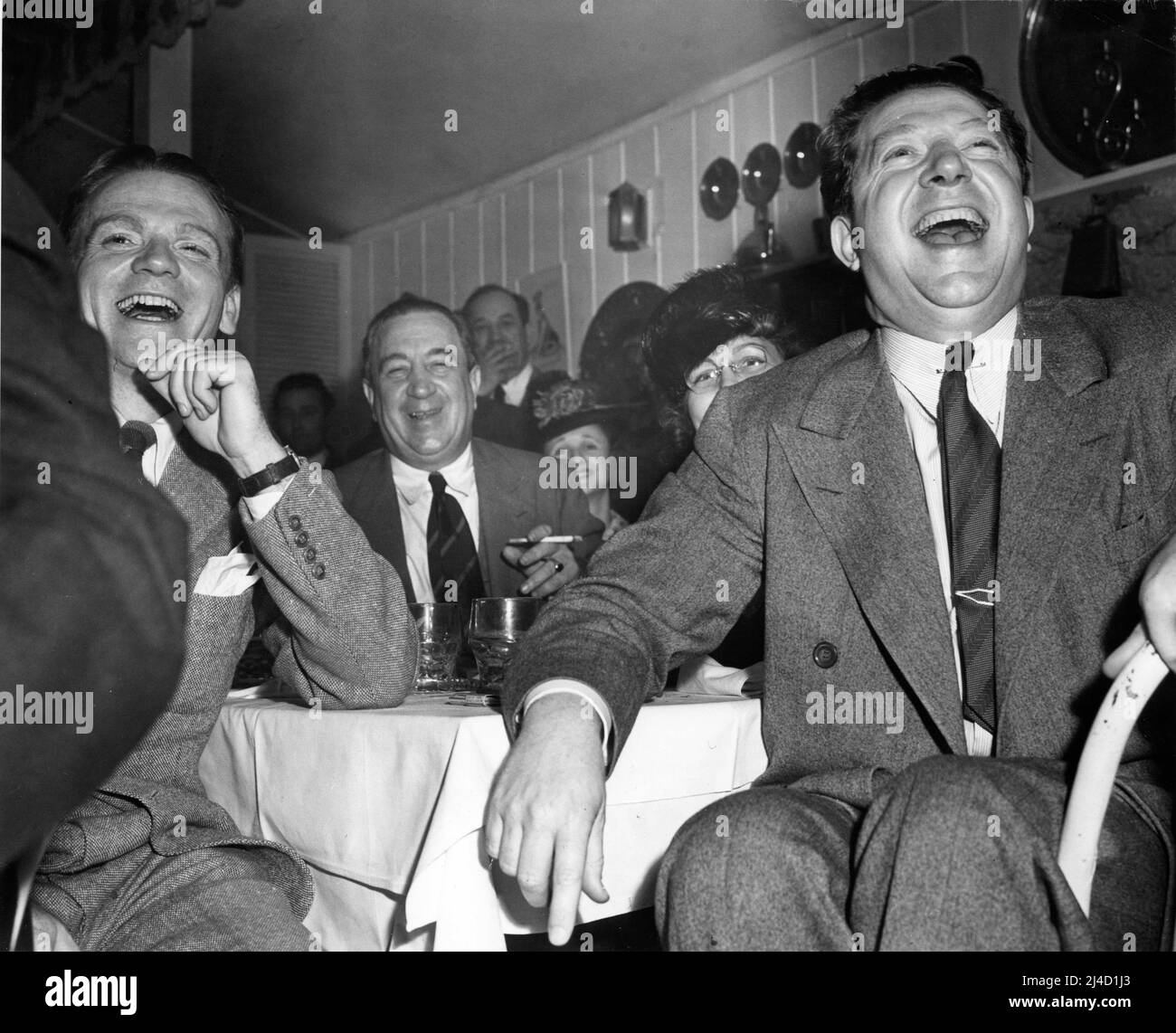 JAMES CAGNEY HUGH HERBERT and FRANK McHUGH candid in May 1939 at the nightclub Grace Hayes Lodge in the San Fernando Valley California Stock Photo