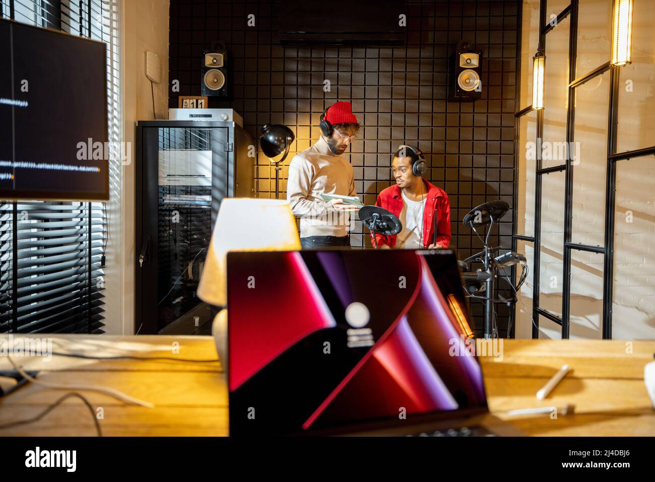 Men playing electric drums at home sstudio Stock Photo