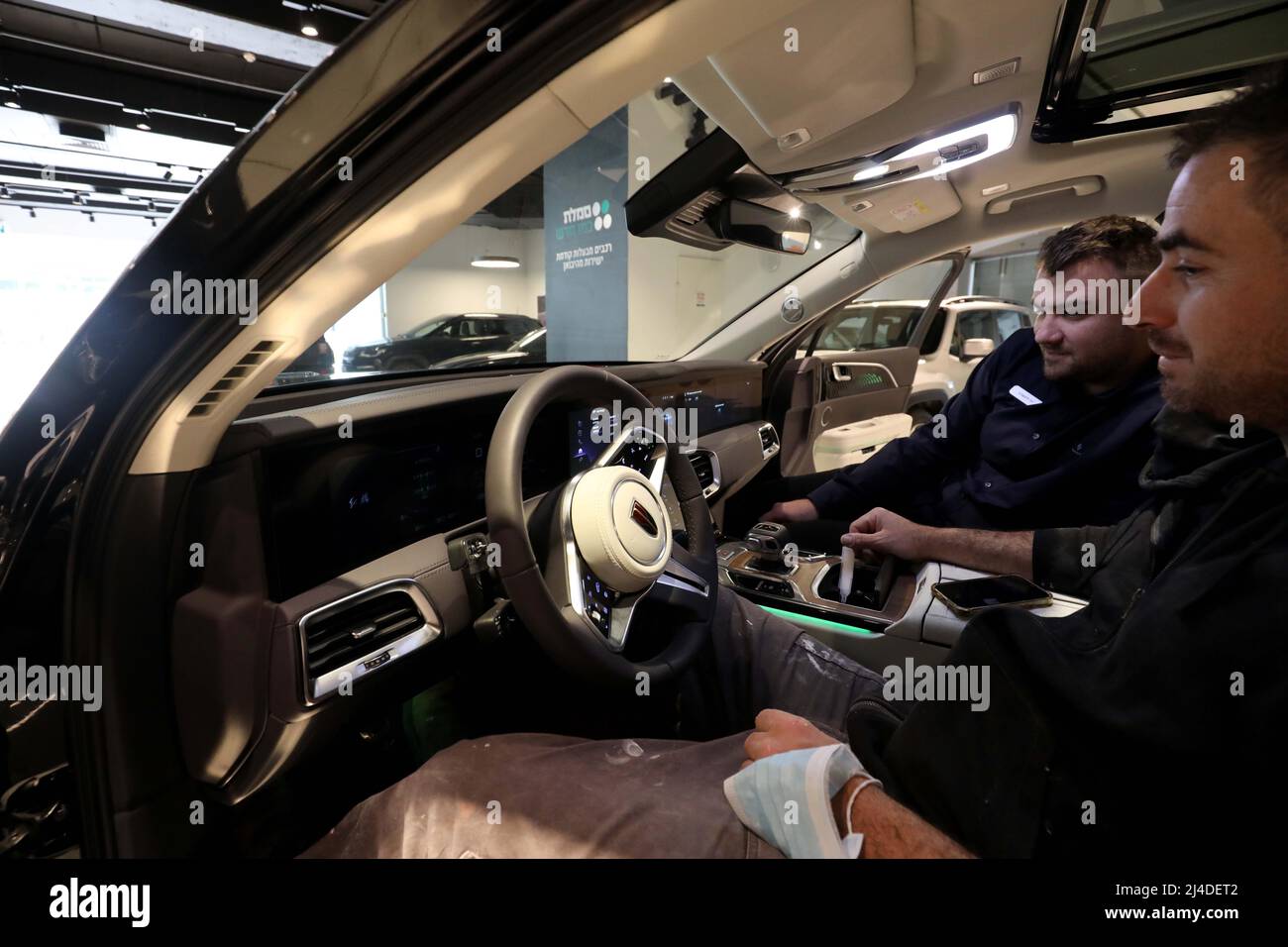 Israel Automakers Tel Aviv, Israel. 14th Apr, 2022. People sit in China's Hongqi E-HS9 ...