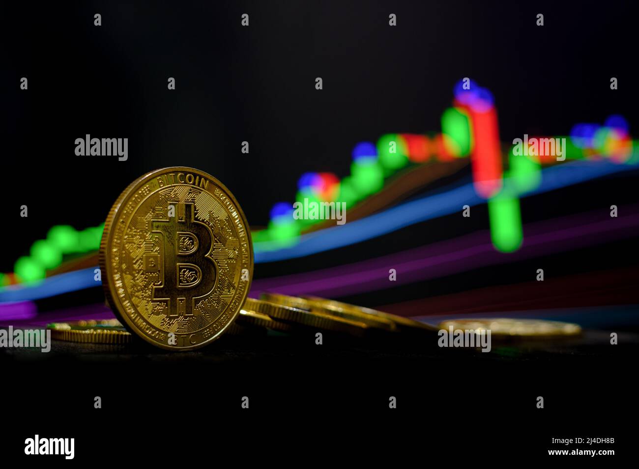 Golden bitcoin cryptocurrency at trading chart background Stock Photo ...