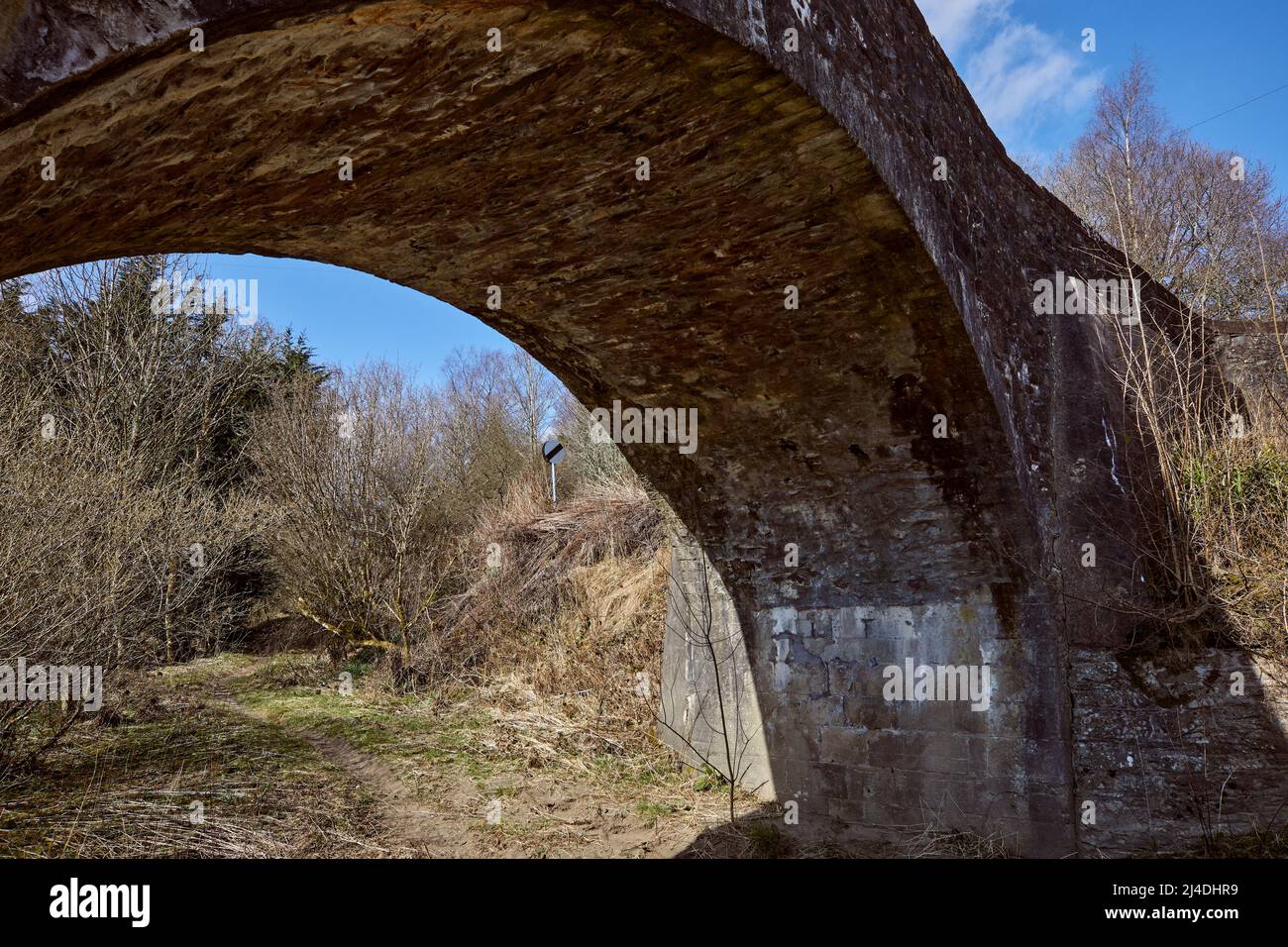 Underside of an arch of the bridge over the river Esk at Bentpath Stock Photo