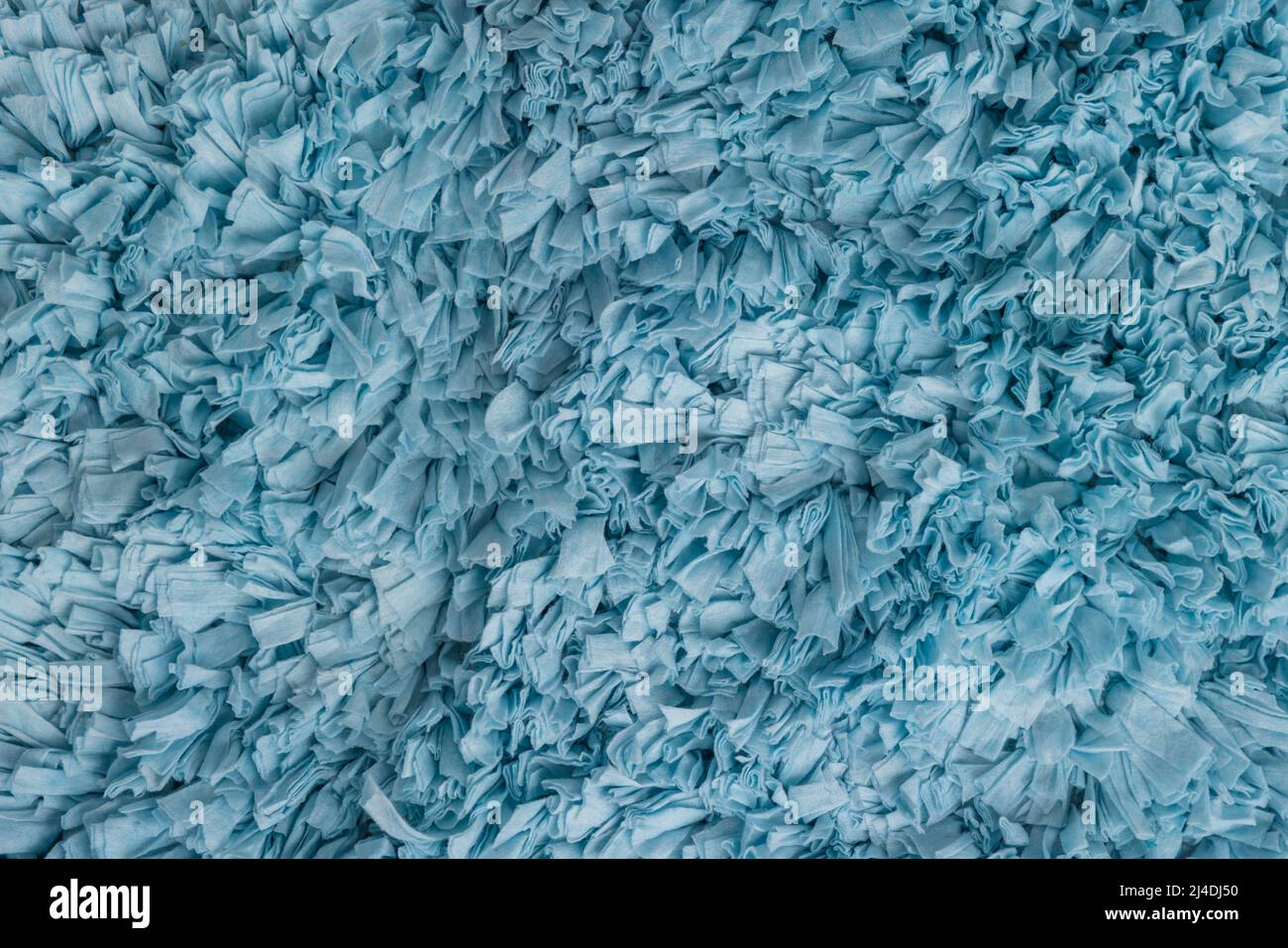 Baby blue textured rug background Stock Photo