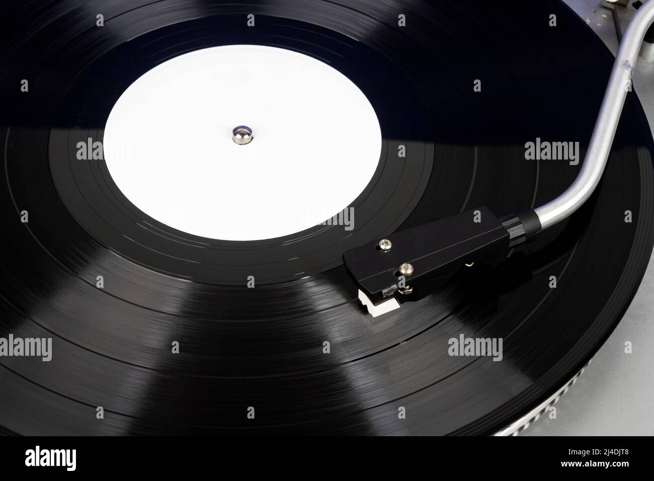 Close up of turntable needle on a vinyl record. Turntable playing vinyl