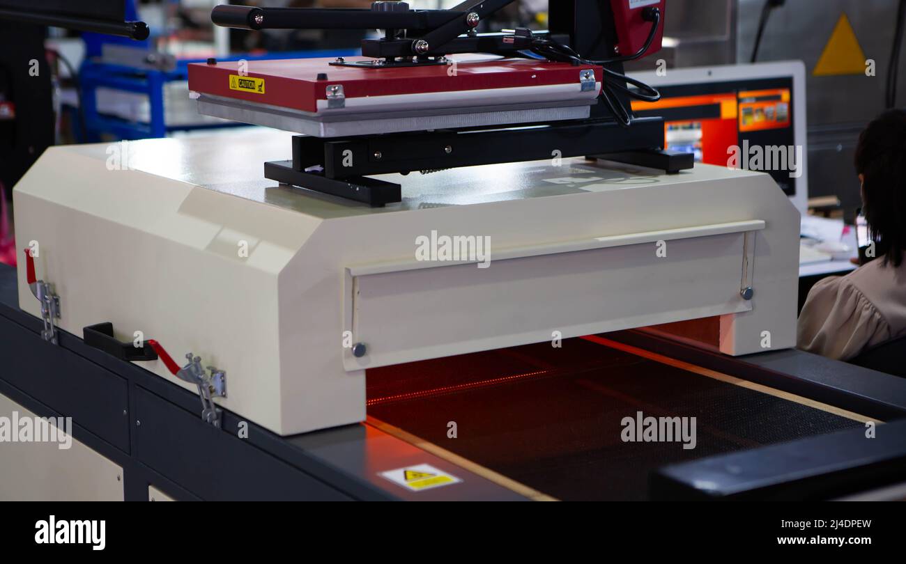 Infrared tshirt screen print drying machine. Printing industry Stock