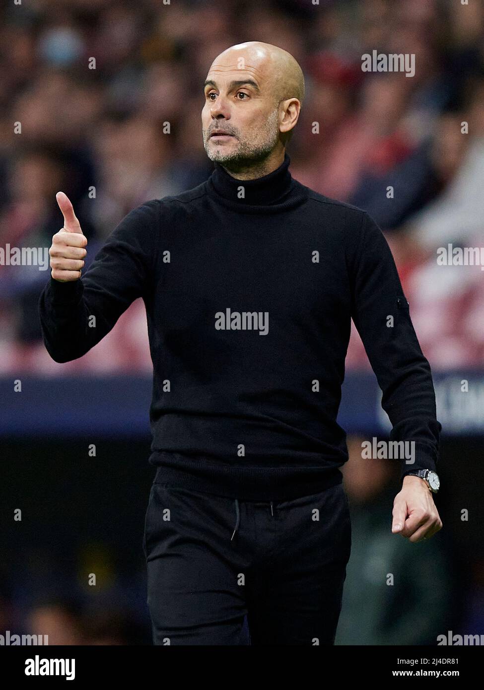 Manchester City head coach Pep Guardiola    during the UEFA Champions League match, Quarter Final, Second Leg, between Atletico de Madrid and Manchester City played at Wanda Metropolitano Stadium on April 13, 2022 in Madrid, Spain. (Photo by Ruben Albarran / PRESSINPHOTO) Stock Photo