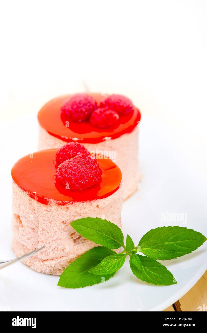 Round Raspberry Sweets fresh raspberry cake mousse dessert round shape with mint leaves Stock ...