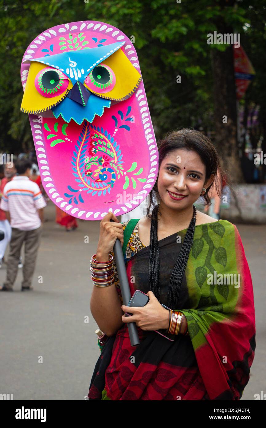 Bangladeshi people take part in a rally Mangal Shobhajatra in