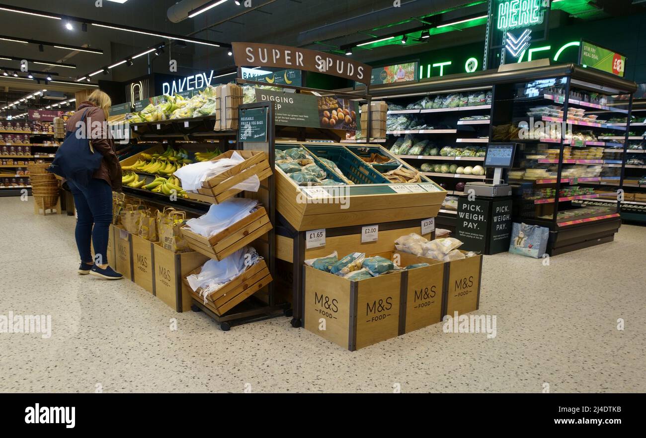 Shopper buying fruit in superstore Stock Photo