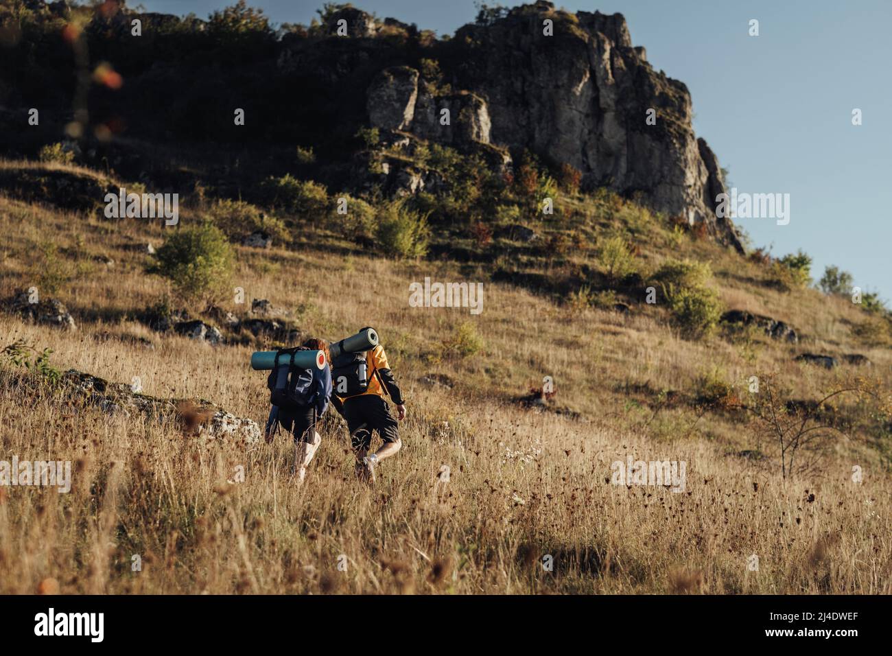 Two Hikers Moving on Their Route on Top of Hill During Sunset, Travel ...