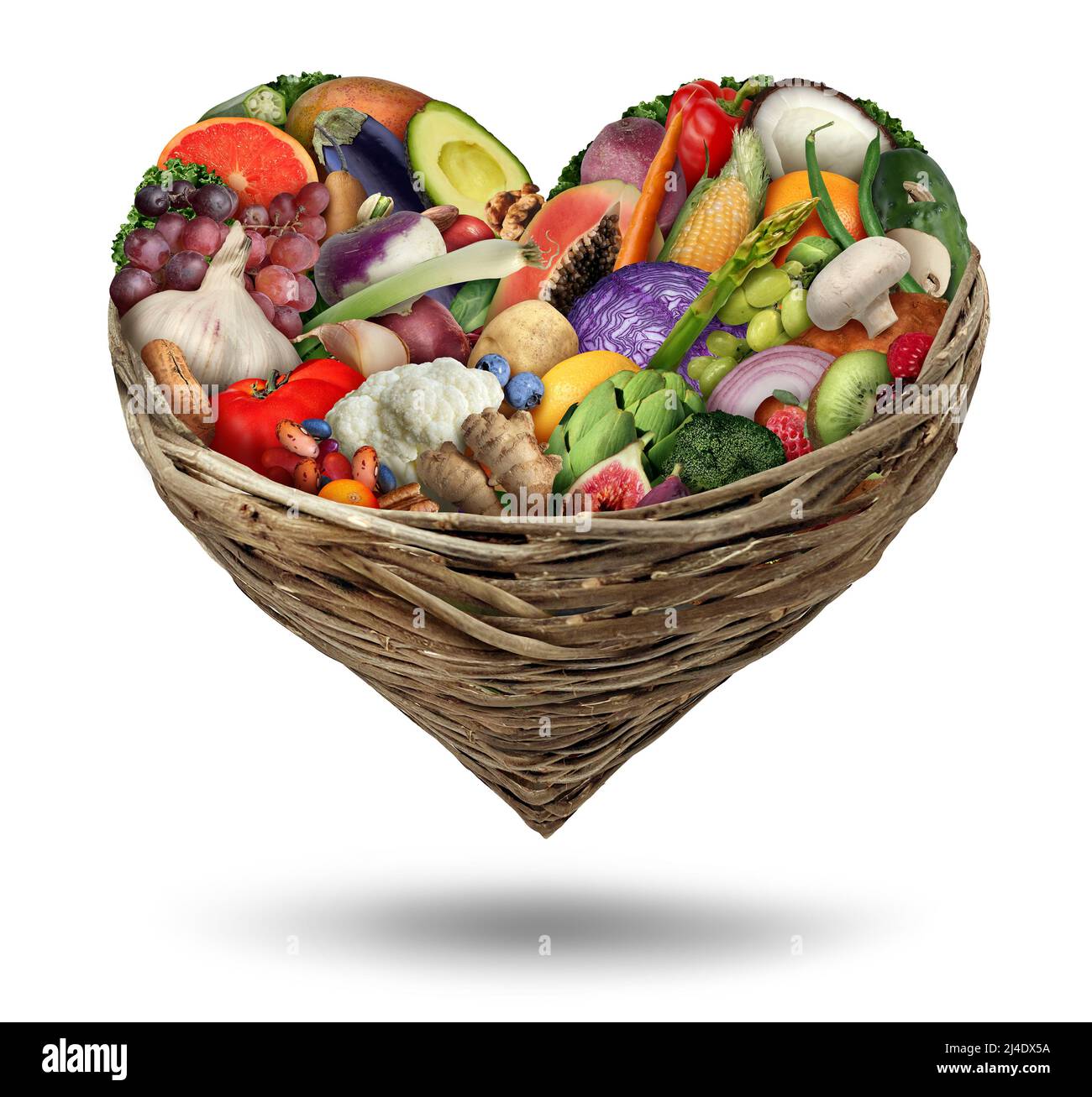 Fruit and vegetables love and heart health symbol in a cornucopia basket as a healthy food and fresh ripe fruits and nuts with beans as a diet. Stock Photo
