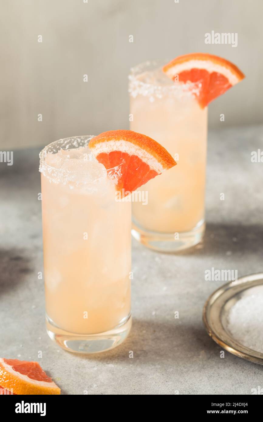 Cold Refreshing Tequila Paloma Cocktail with Grapefruit and Salt Stock
