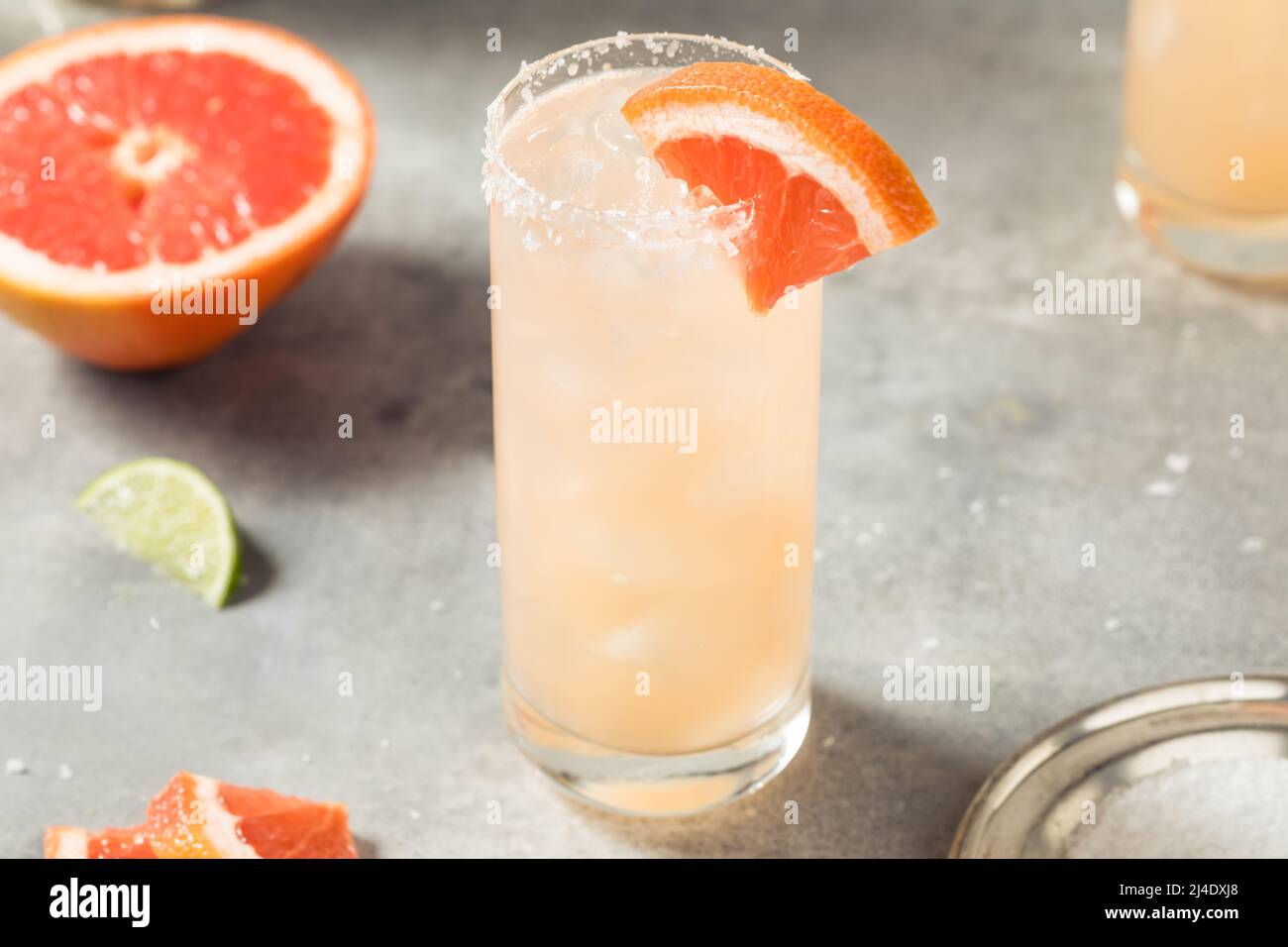 Cold Refreshing Tequila Paloma Cocktail with Grapefruit and Salt Stock