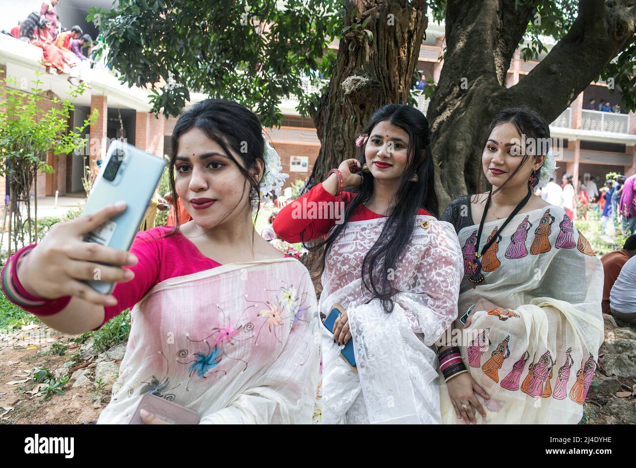 Dhaka, Bangladesh. 14th Apr, 2022. Young ladies take a selfie to celebrate  the first day of the Bengali New Year or Pohela Boishakh in Dhaka.  Thousands of Bangladeshi people celebrate the first