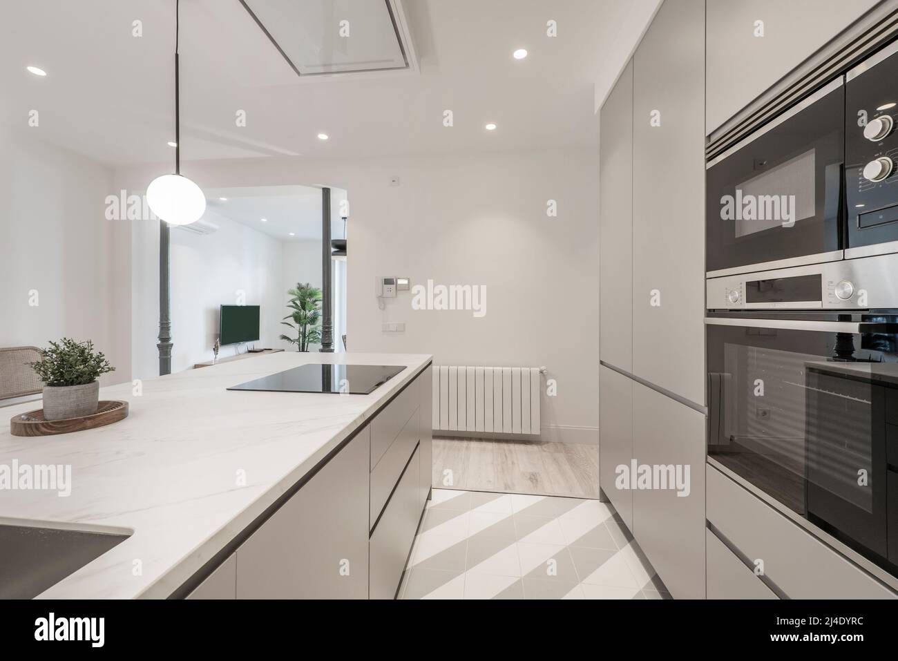 Kitchen island with builtin stainless steel sink, black ceramic hob