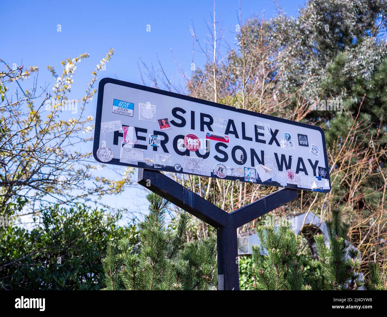 Manchester UK April 2022 Famous road side sign Sir Alex Ferguson Way Old Trafford Manchester United Stock Photo