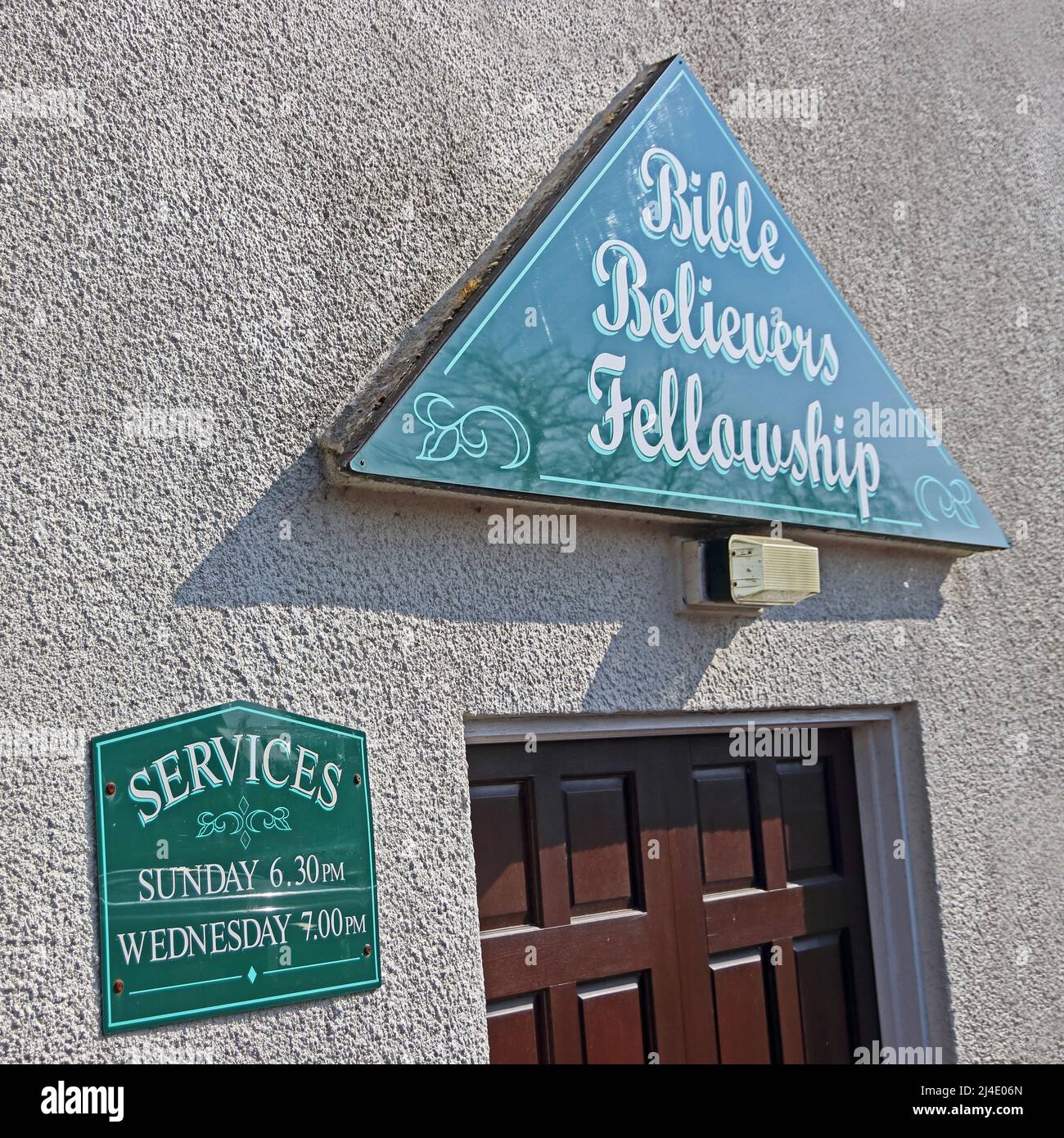Bible Believers Fellowship signs over doorway, Pickering Stock Photo