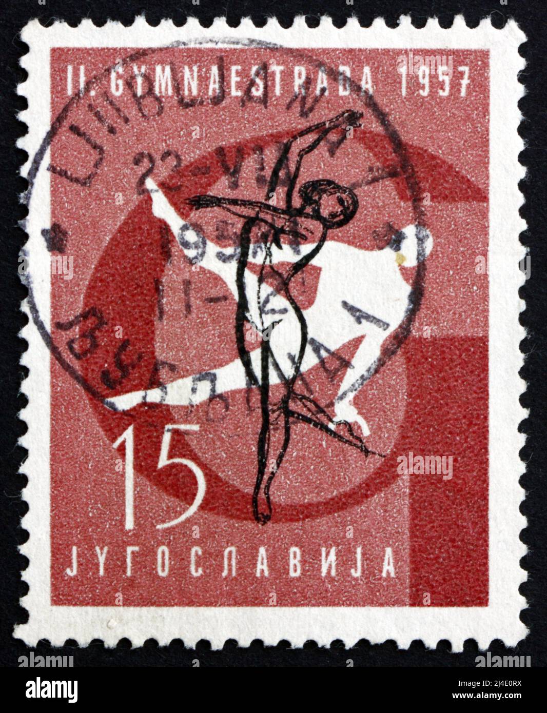YUGOSLAVIA - CIRCA 1957: a stamp printed in the Yugoslavia shows Gymnastic Position, Pommel Horse, 2nd Gymnastic Meet, Zagreb, circa 1957 Stock Photo