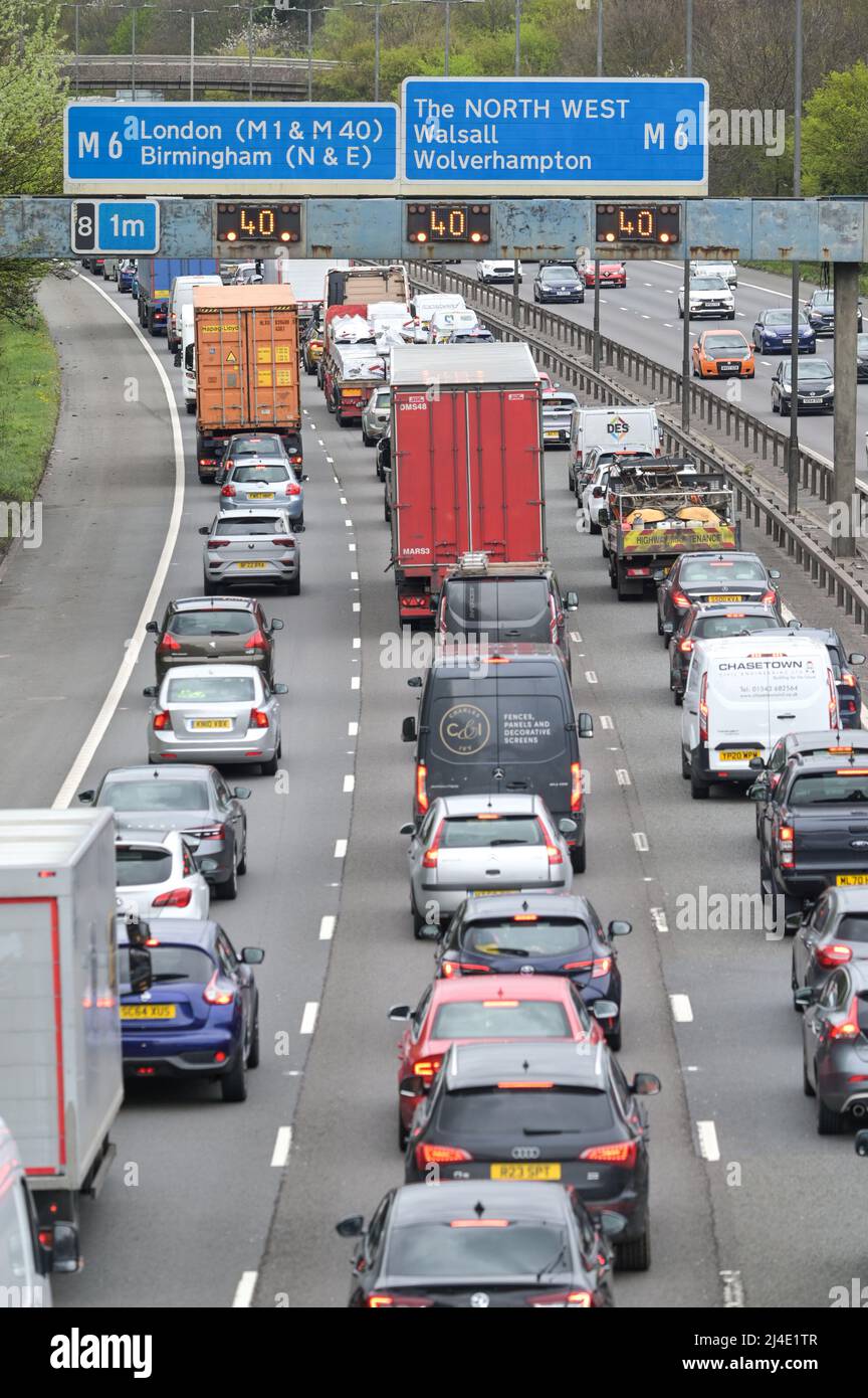 West Bromwich, Birmingham, England, April 14th 2022. Bank Holiday traffic is building on the M5 Motorway near West Bromwich as motorists try to get an early getaway before heavily congested roads predicted on Good Friday. The motorway stretch joins the M6 Northbound towards Wolverhampton and Southbound towards London. Credit: Katie Stewart/Alamy Live News Stock Photo
