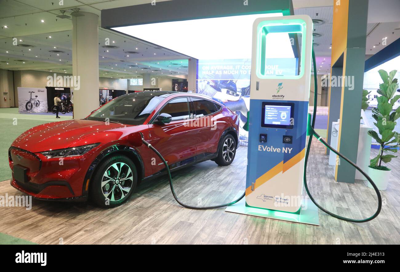 New York, New York, USA. 14th Apr, 2022. A view of a CHARGE PORT with a FORD'S MUSTANG MACH-E electric vehicle on display at the 2022 New York Auto Show held at the Jacob Javits Center. (Credit Image: © Nancy Kaszerman/ZUMA Press Wire) Credit: ZUMA Press, Inc./Alamy Live News Stock Photo