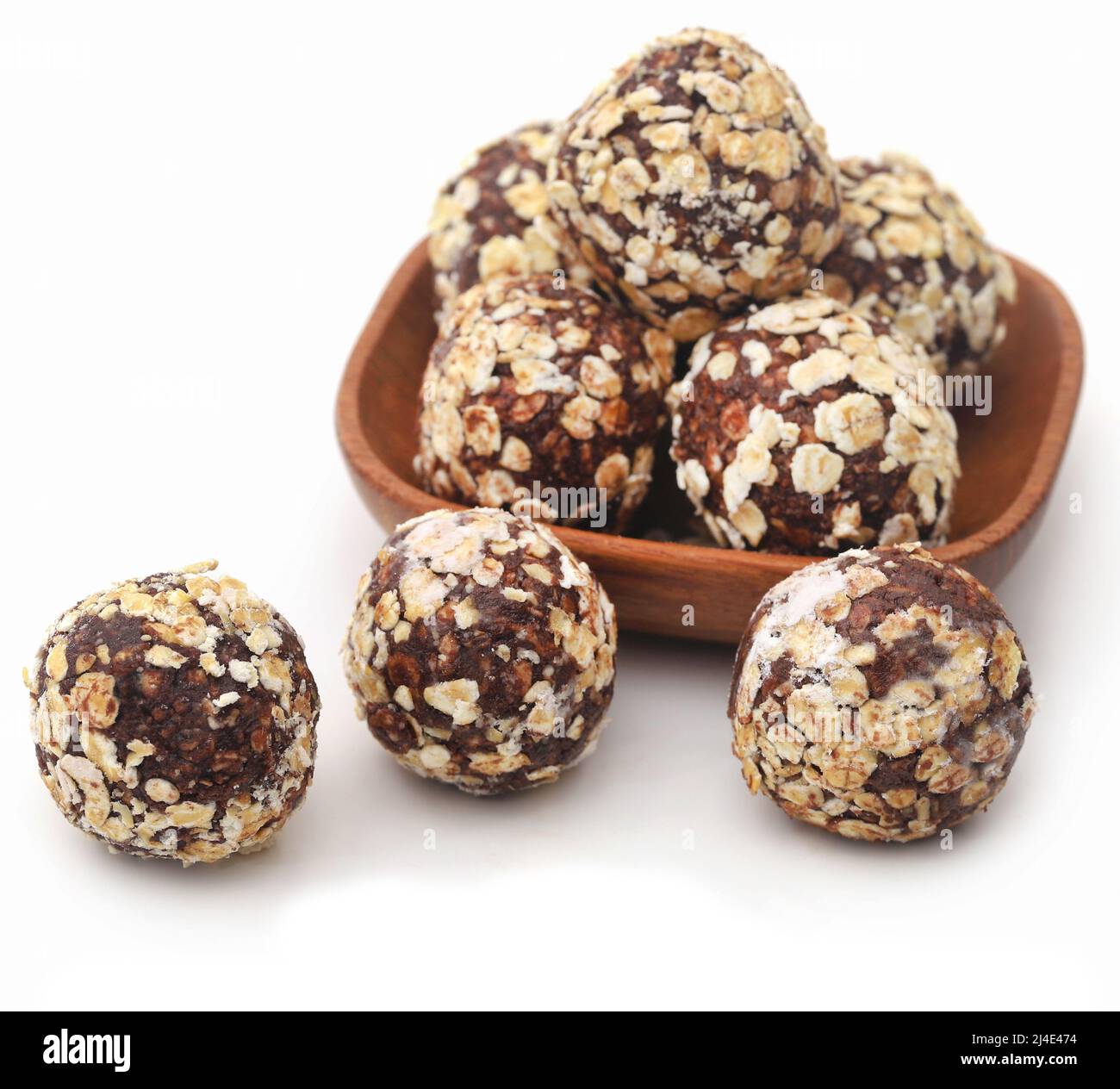 Oatmeal balls, a popular Christmas candy over white background Stock