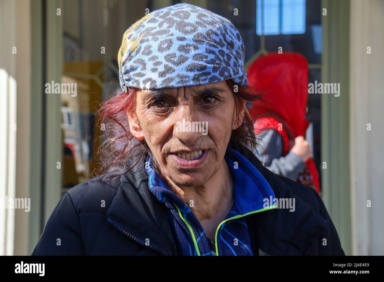 Przemysl, Poland. 13th Apr, 2022. A Roma Woman with animal print head scarf and striking face at PrzemysÅ‚ Train station (Credit Image: © Amy Katz/ZUMA Press Wire) Stock Photo