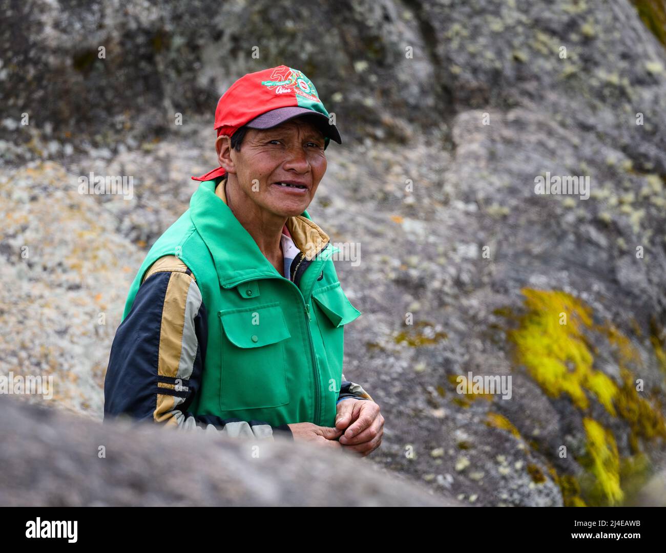 An indigenous man serves as tour guide in the remote Andes. Colombia, South America. Stock Photo