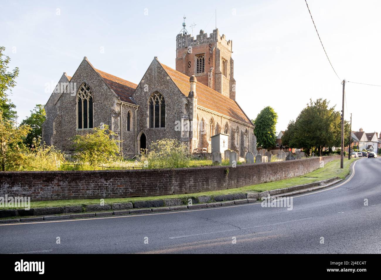 The church and churchyard of the Anglican Parish Church of St. Andrew in the Essex village of Earls Colne Stock Photo