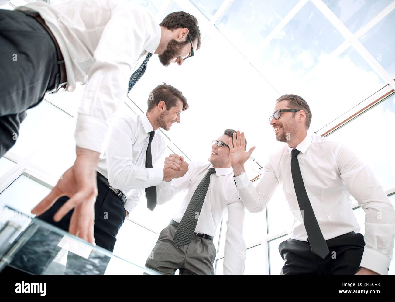 bottom view.happy business team celebrating victory Stock Photo