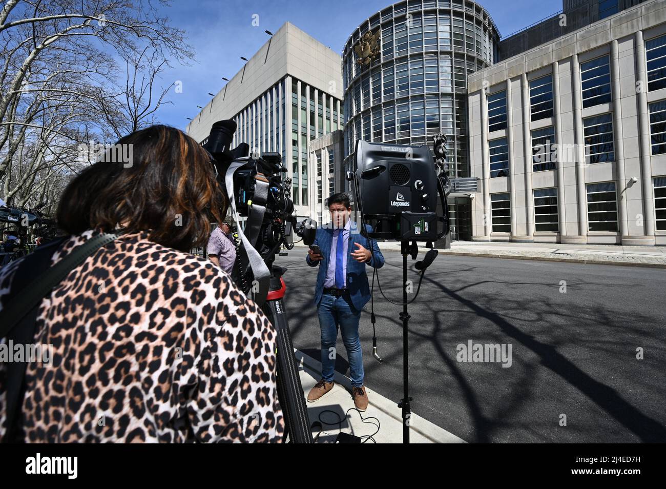 New York, USA. 14th Apr, 2022. Members of the media cover the court appearance of Frank James outside the federal courthouse in Brooklyn, New York on Apr. 14, 2022. Frank James appeared in court on charges he discharged a firearm and used smoke canisters on a subway train at the 36th Street N train station on Apr. 12, 2022. (Photo by Anthony Behar/Sipa USA) Credit: Sipa USA/Alamy Live News Stock Photo
