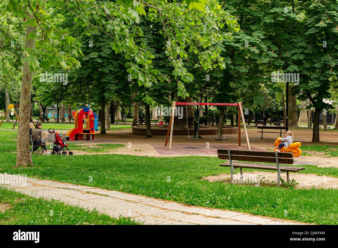 Children playground in Montagnola park, Bologna,  Emilia-Romagna, Italy Stock Photo