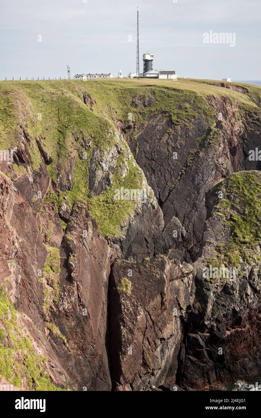 Cliffs at St Ann's Head lighthouse, Dale, Pembrokeshire, Wales, UK Stock Photo