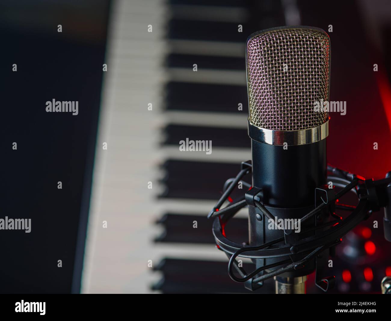 MIDI keyboard, synthesizer and microphone. Music, vocals, concert