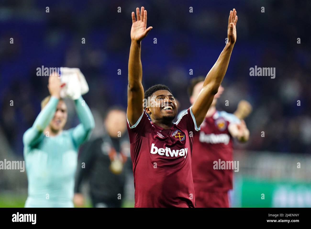 West Ham United's Ben Johnson celebrates in front of fans after the final  whistle in the UEFA Europa League quarter final, second leg match at the  Groupama Stadium in Lyon, France. Picture