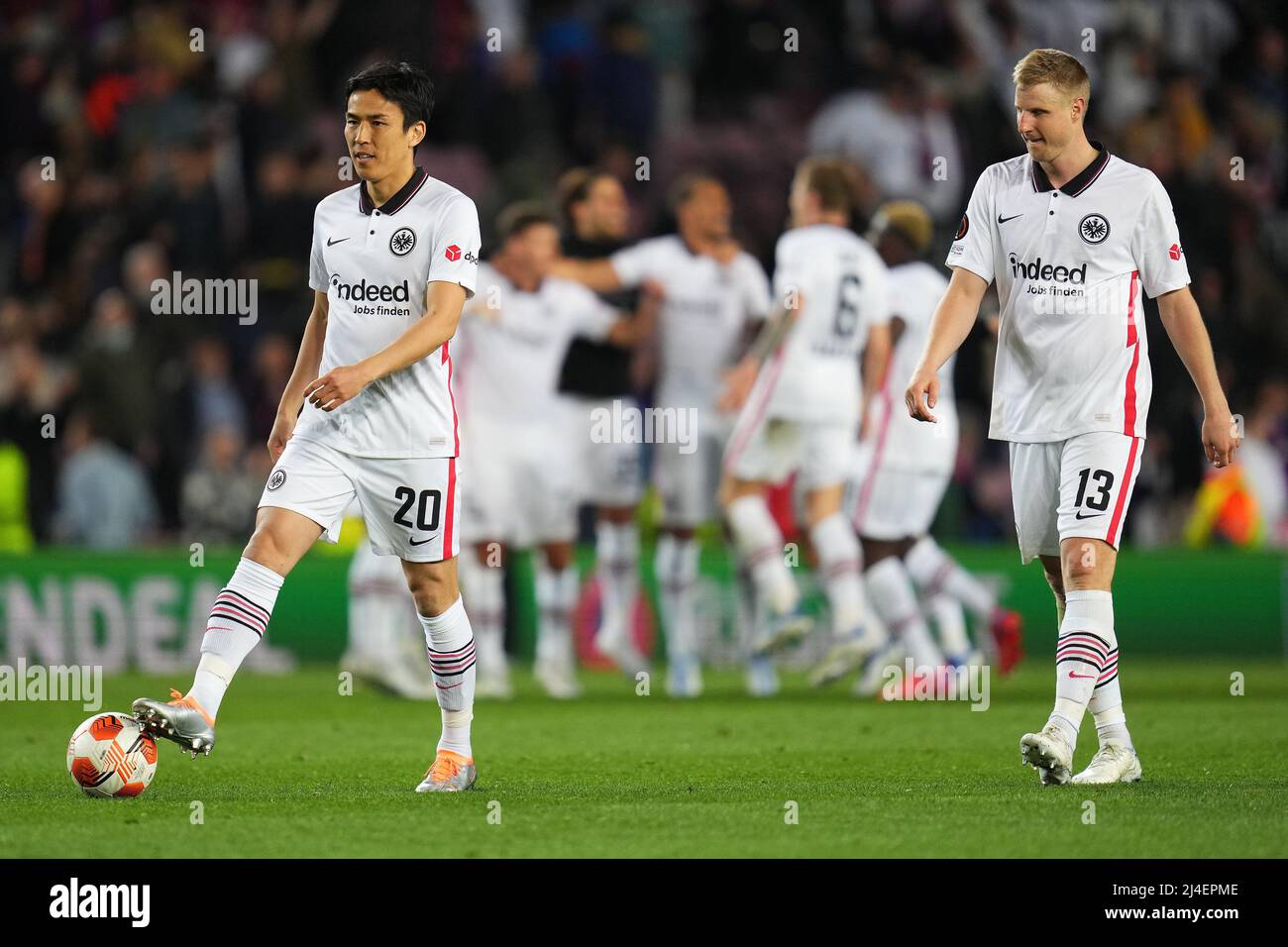 Makoto Hasebe and Martin Hinteregger of Eintracht Frankfurt at full time during the UEFA Europa League match, Quarter Final, Second Leg, between FC Barcelona and Eintracht Frankfurt played at Camp Nou Stadium on April 14, 2022 in Barcelona, Spain. (Photo by Colas Buera / PRESSINPHOTO) Stock Photo