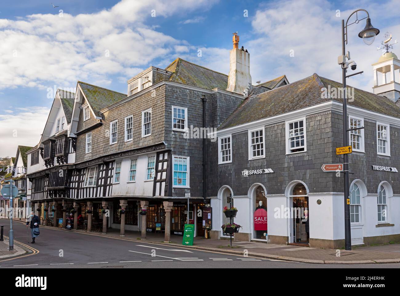 The Butterwalk, historic buildings in Dartmouth, South Hams, Devon. Granite columns hold up the wooden fascia of the Stuart houses. Stock Photo