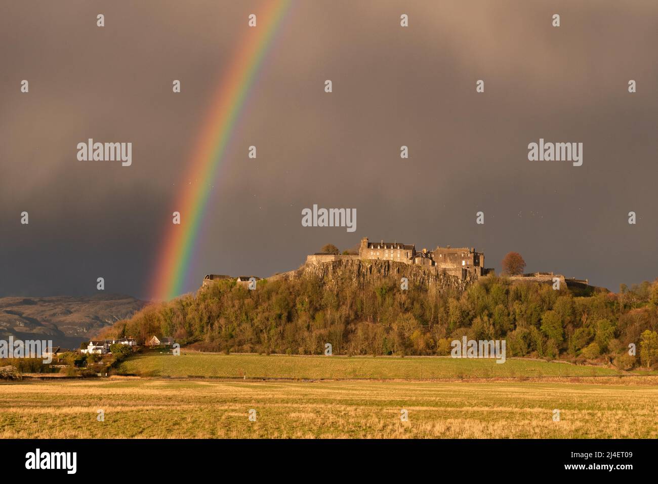 Rainbow and dark skies over Stirling Castle, Stirling, Scotland, UK Stock Photo