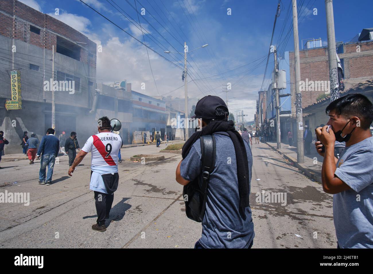Huancayo. March 02, 2022. Civil demonstrations during the strike of transporters and farmers, there were clashes between police and the population wit Stock Photo