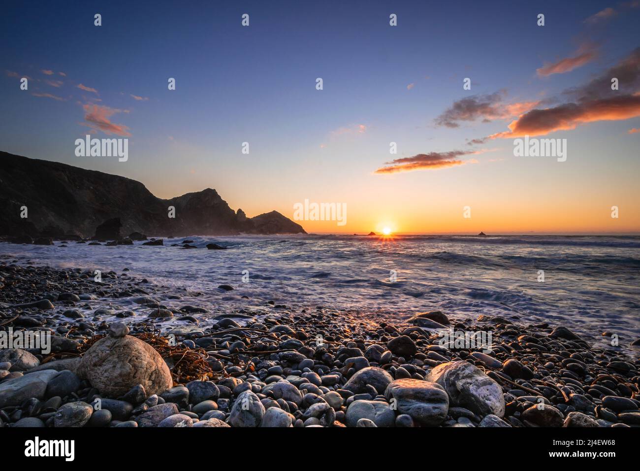 A sunset from Willow Creek beach in Big Sur CA Stock Photo