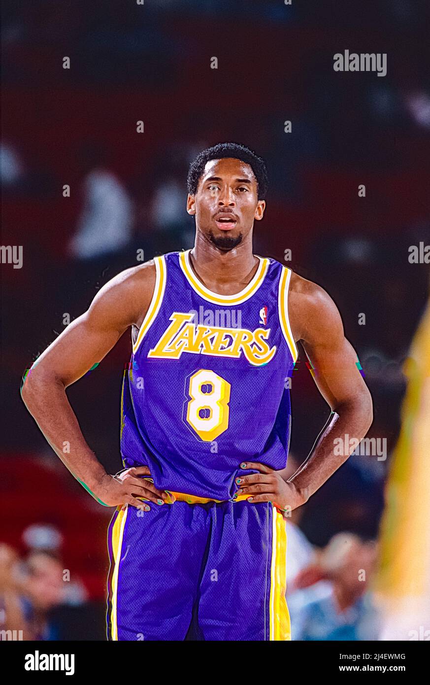 Kobe Bryant competing for the Los Angeles Lakers during his rookie season in a game against the Denver Nuggets in 1997 Stock Photo