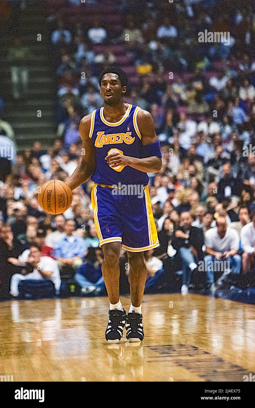 Kobe Bryant competing for the Los Angeles Lakers during his rookie season  in a game against the Denver Nuggets in 1997 Stock Photo - Alamy