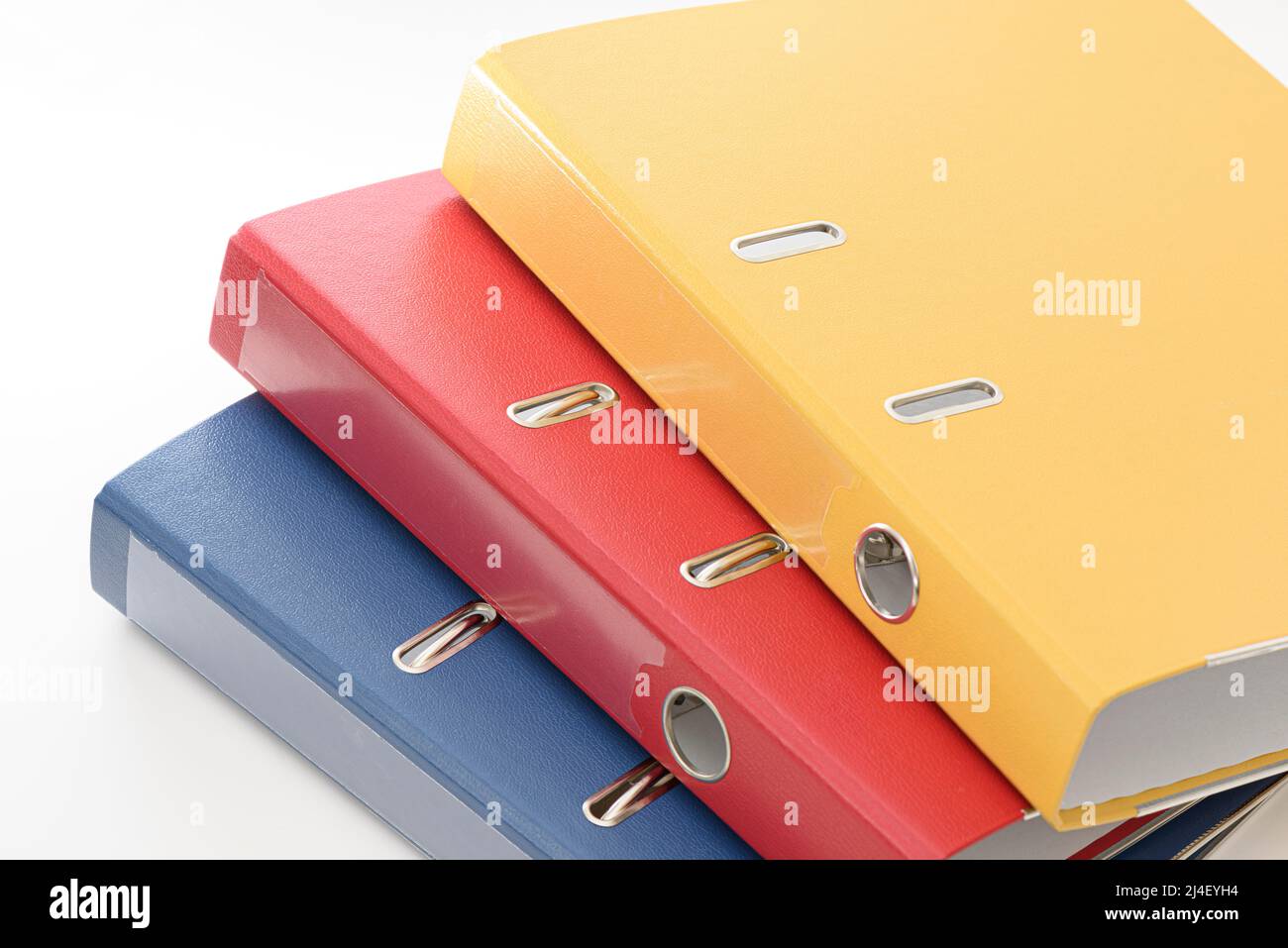 Yellow, red and blue empty office folder on white background Stock ...